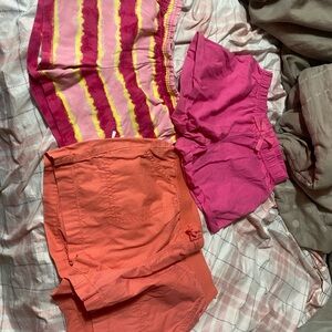 Place Girls' Pink, Coral Orange, and Striped Pink-Yellow Shorts Set of 3 pairs